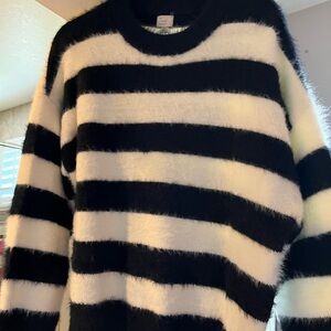 Long sleeve sweater.  Cozy & soft.  Black and white stripes.  Never been worn.